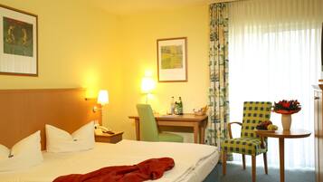 Desk, laptop workspace, blackout drapes, free cribs/infant beds