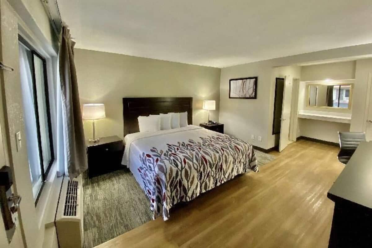 Blackout drapes, soundproofing, iron/ironing board, free WiFi