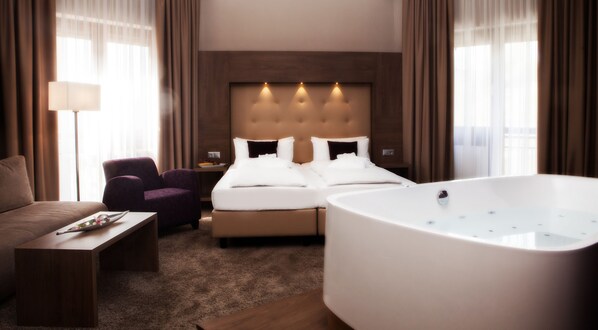 Honeymoon suite | Hypoallergeen beddengoed, donsdekens, een minibar, een kluis op de kamer