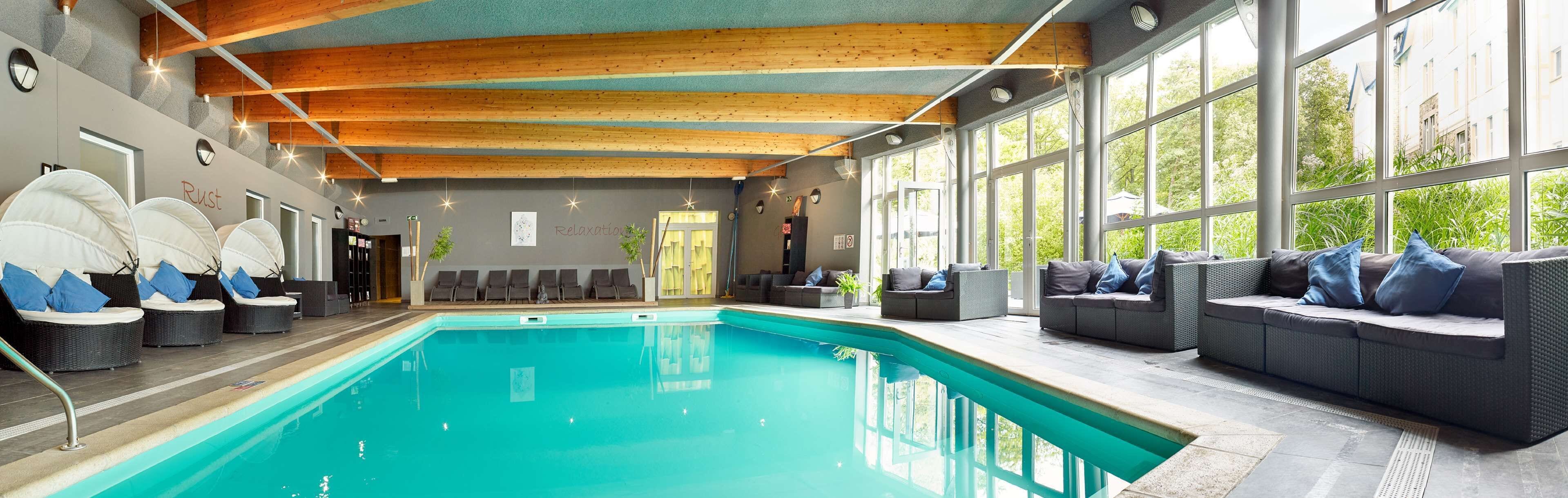 indoor pool, open 8:00 am to 10:00 pm, pool loungers