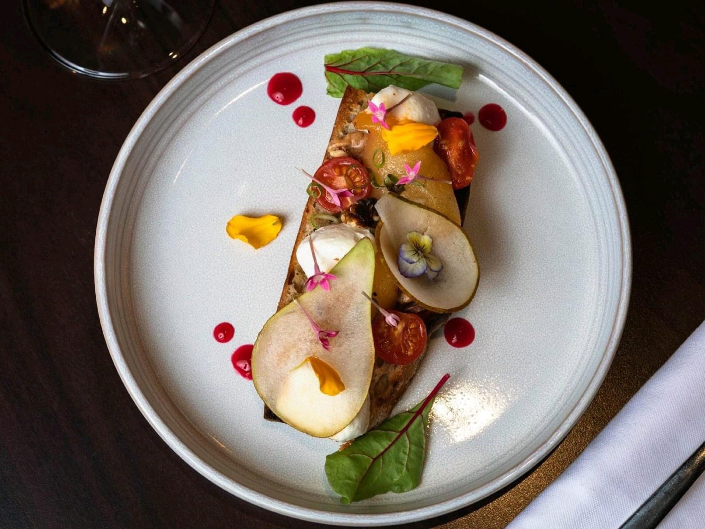 A plate of food with various toppings and garnishes.