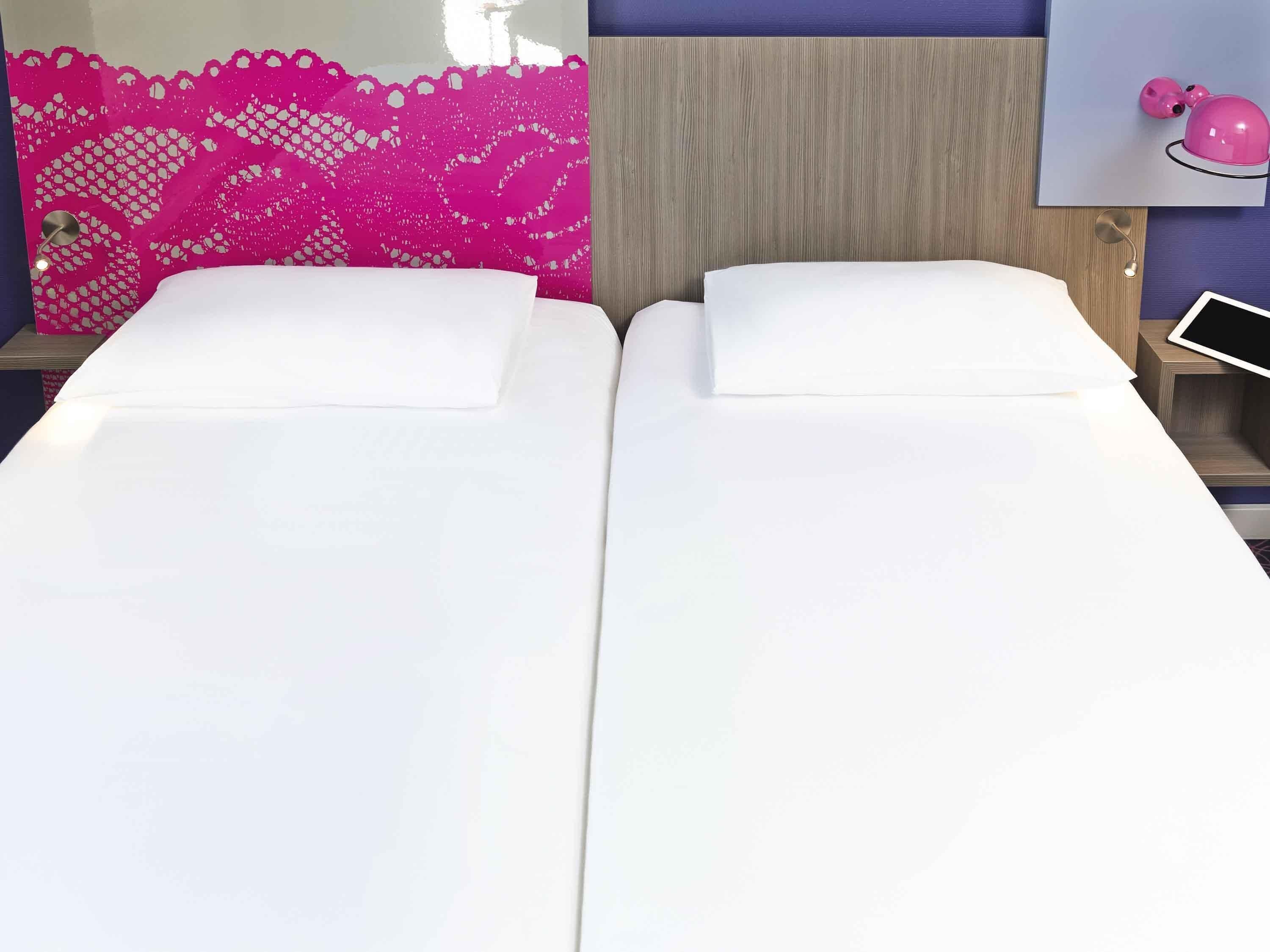 Premium bedding, desk, blackout drapes, soundproofing