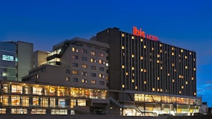 A hotel with a modern design, featuring multiple floors and a prominent 'ibis hotel' sign. - ibis Paris 17 Clichy-Batignolles (Paris)