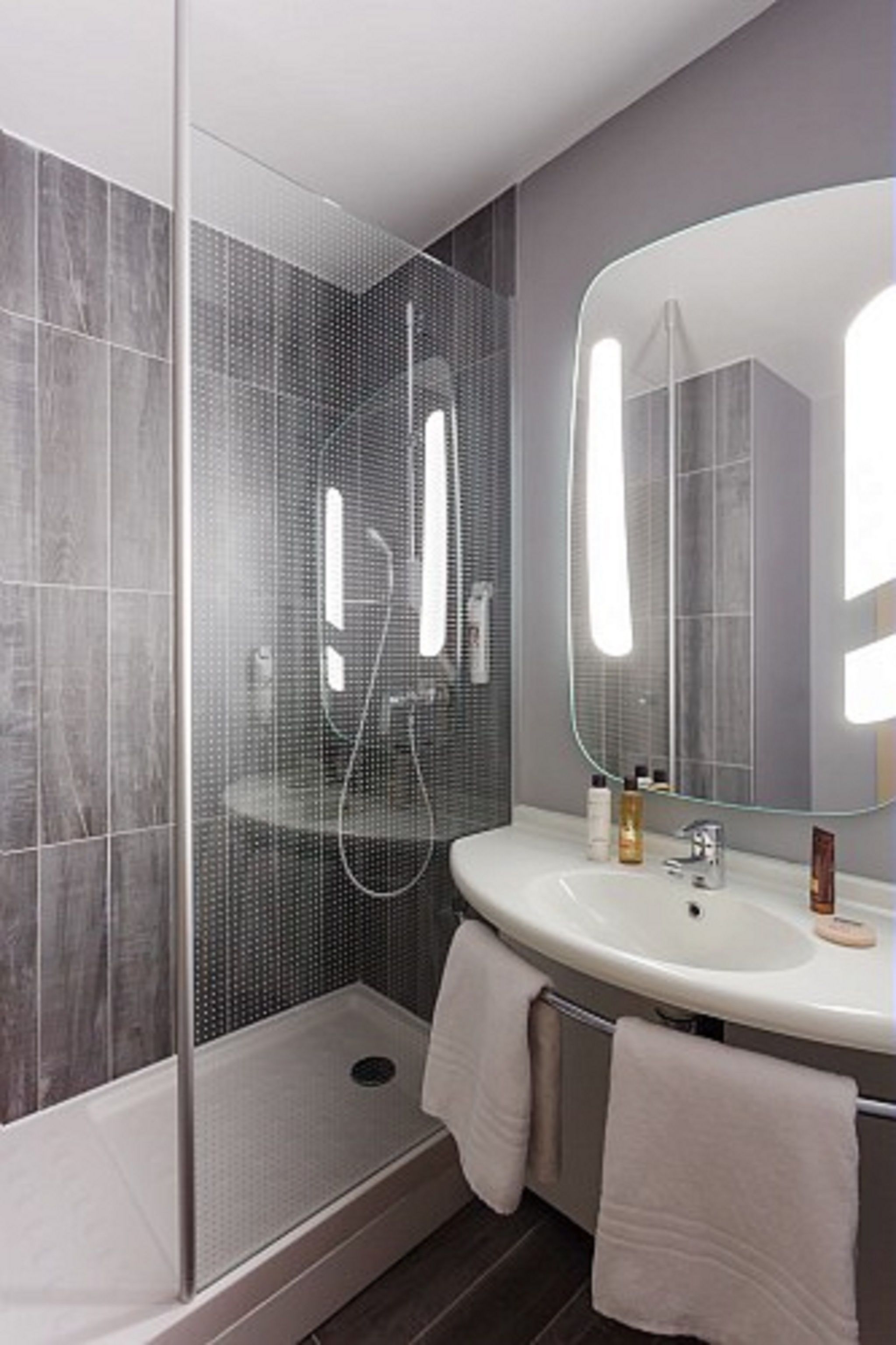 eco-friendly toiletries, hair dryer, towels