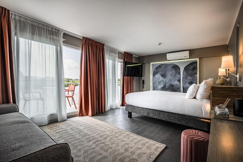 Chambre Privilège | Ropa de cama de alta calidad y caja de seguridad en la habitación 