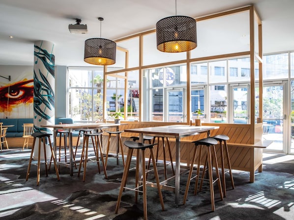 Rooftop bar, garden views, open selected days