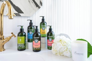 Eco-friendly toiletries, hair dryer, bathrobes, slippers