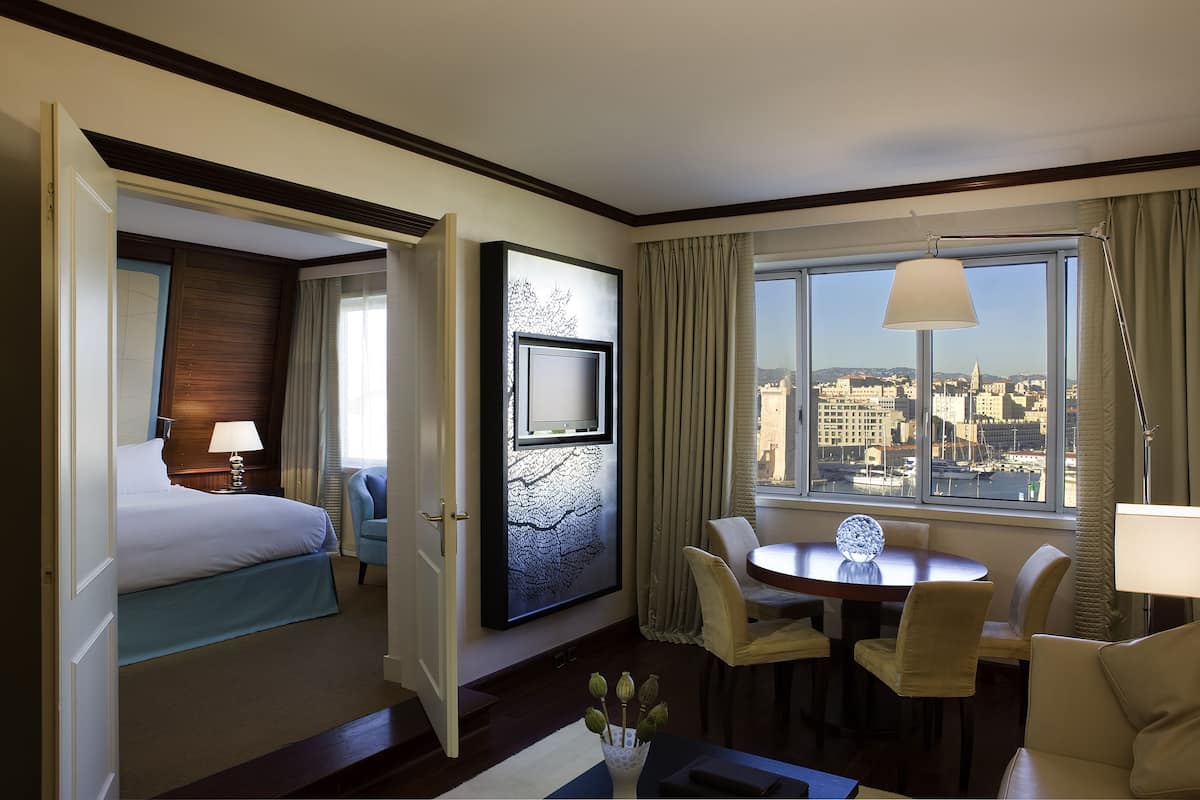 opera suite, 1 king bed (top floor, old port view, lounge, spa and gym access) | premium bedding, pillow-top beds, minibar, in-room safe