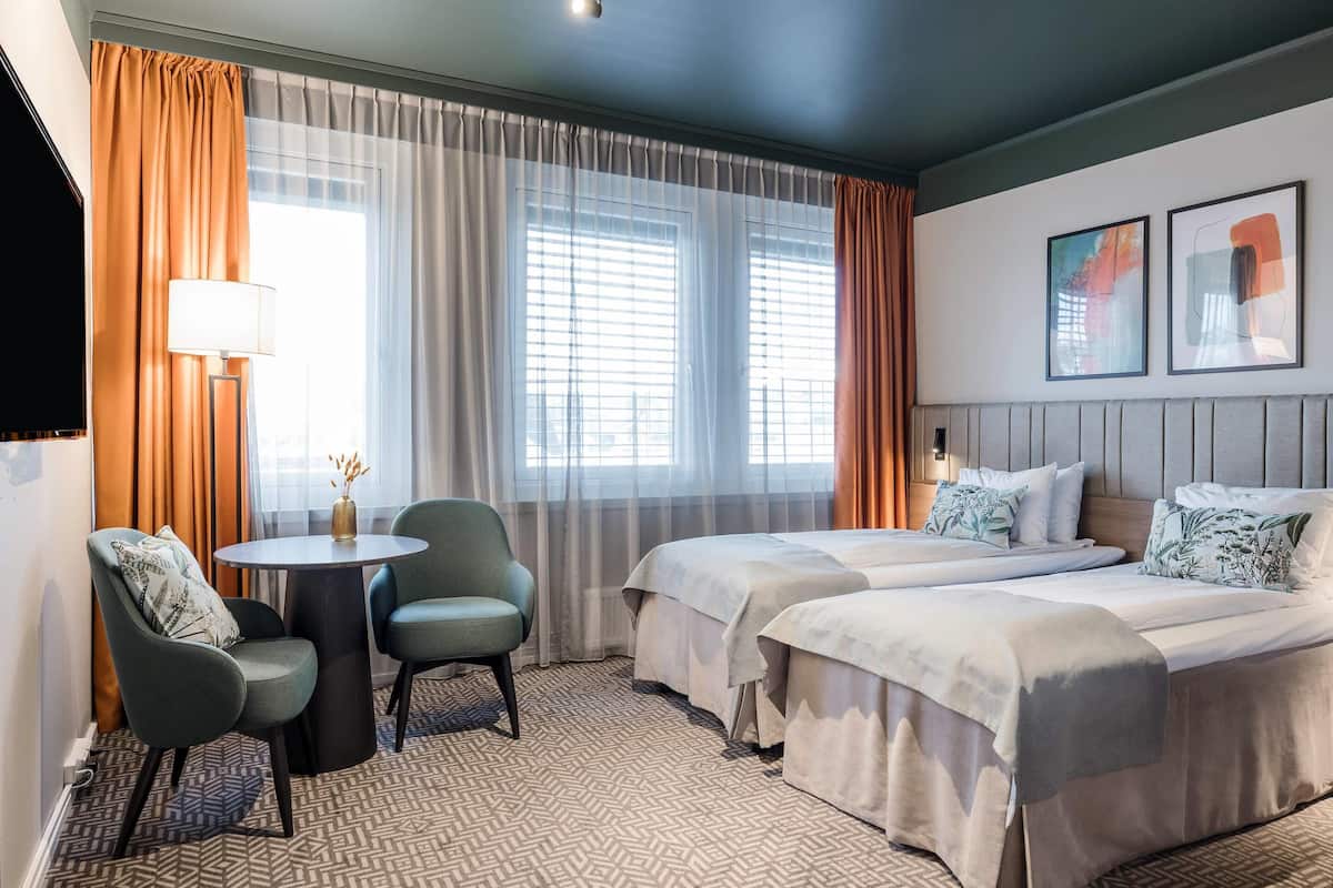 Standard Twin Room, Non Smoking | Minibar, laptop workspace, free WiFi, bed sheets