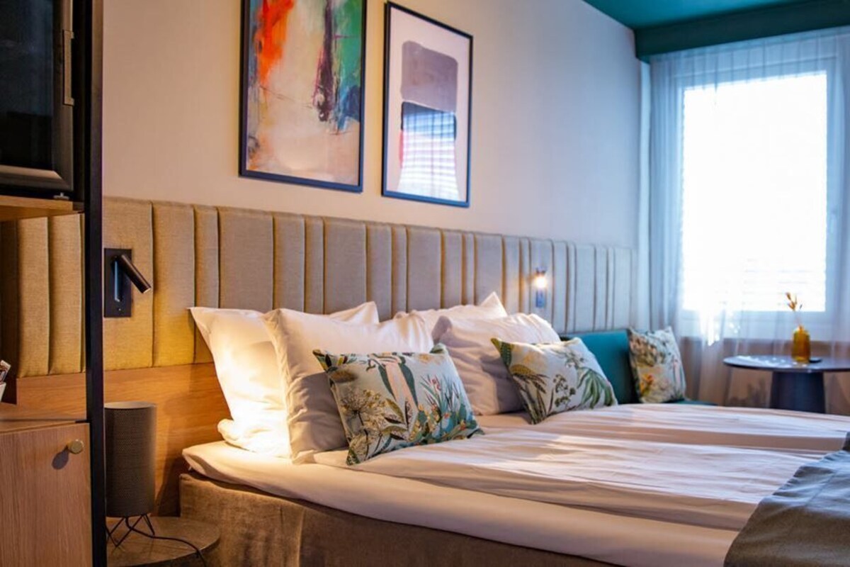 Minibar, laptop workspace, free WiFi, alarm clocks