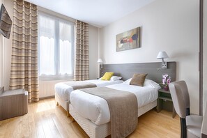 Twin Room | Minibar, in-room safe, desk, free WiFi