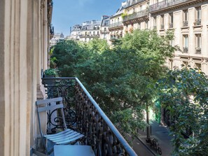 Room Eiffel Tower View - Complimentary soft minibar, courtesy tray, Chromecast, digital press | View from room