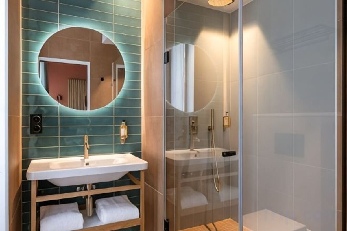 Bathroom | Hair dryer, bathrobes, towels