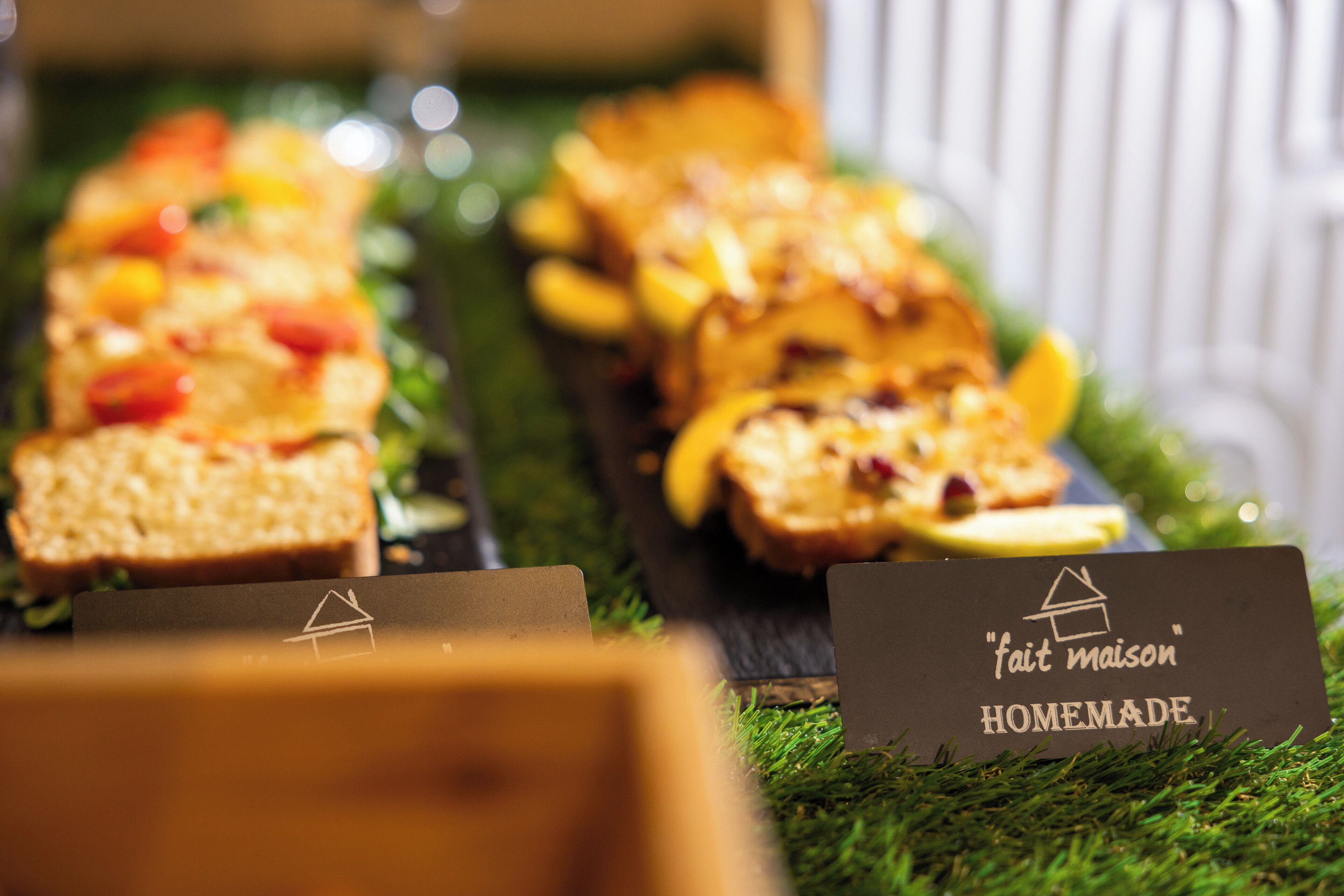 A display of food items with labels indicating they are homemade.