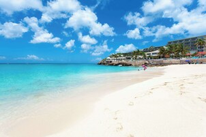 On the beach, sun loungers, beach umbrellas, beach towels