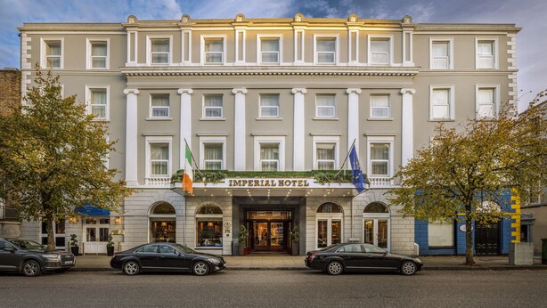 A large, historic building with a classic facade, multiple windows, and a prominent entrance. - Imperial Hotel (Cork)