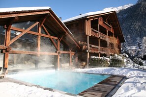 Indoor pool, outdoor pool, pool umbrellas, pool loungers