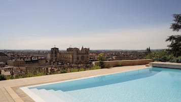 Outdoor pool, pool umbrellas, pool loungers