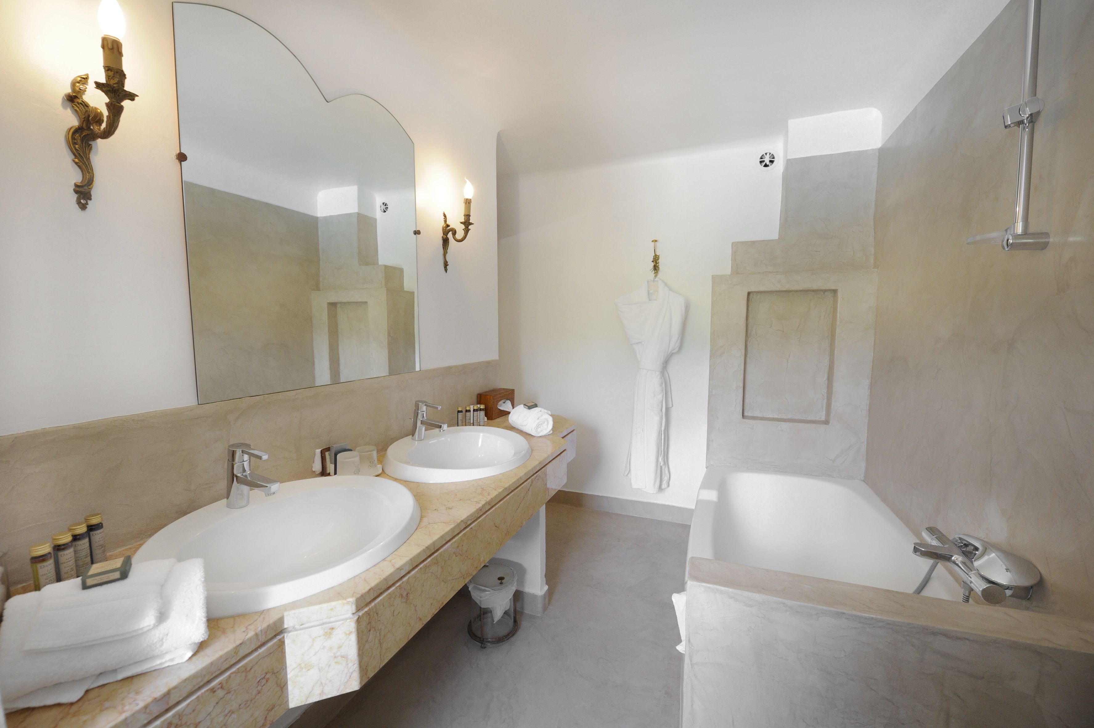 bathtub, designer toiletries, hair dryer, bathrobes