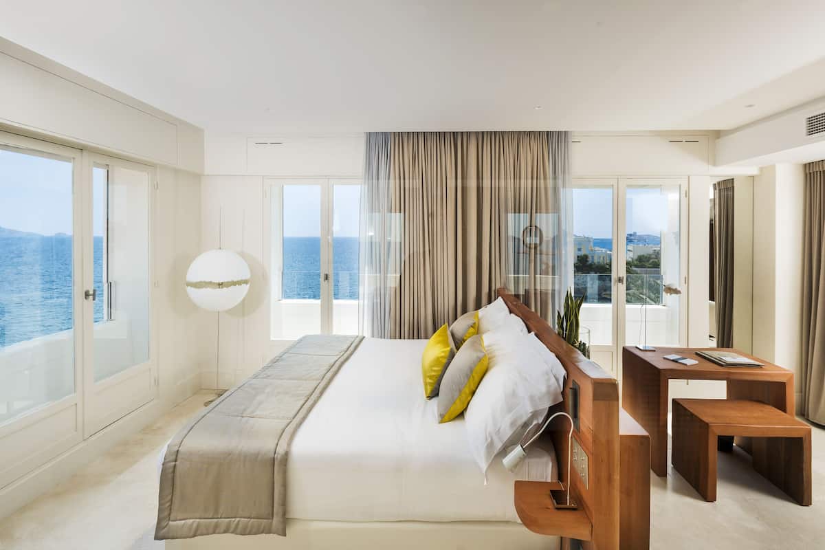 Suite, 1 King Bed, Sea View | 1 bedroom, premium bedding, free minibar, in-room safe