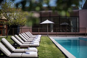 Outdoor pool, pool umbrellas, pool loungers