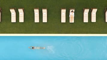 Outdoor pool, pool umbrellas, pool loungers