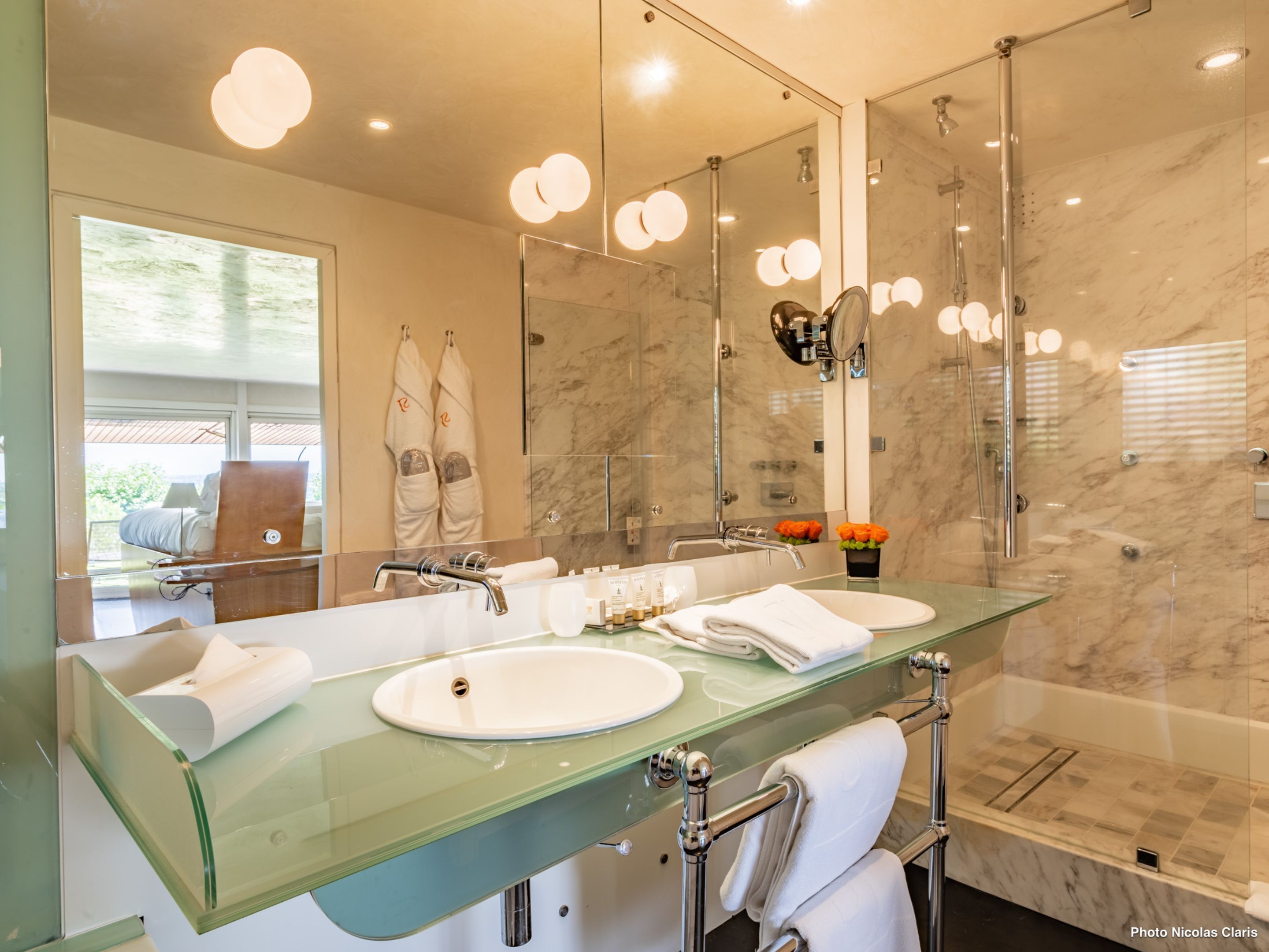 suite jean nouvel | bathroom | designer toiletries, hair dryer, bathrobes, slippers