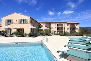 Seasonal outdoor pool, pool umbrellas, pool loungers