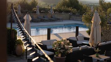 Indoor pool, pool umbrellas, sun loungers