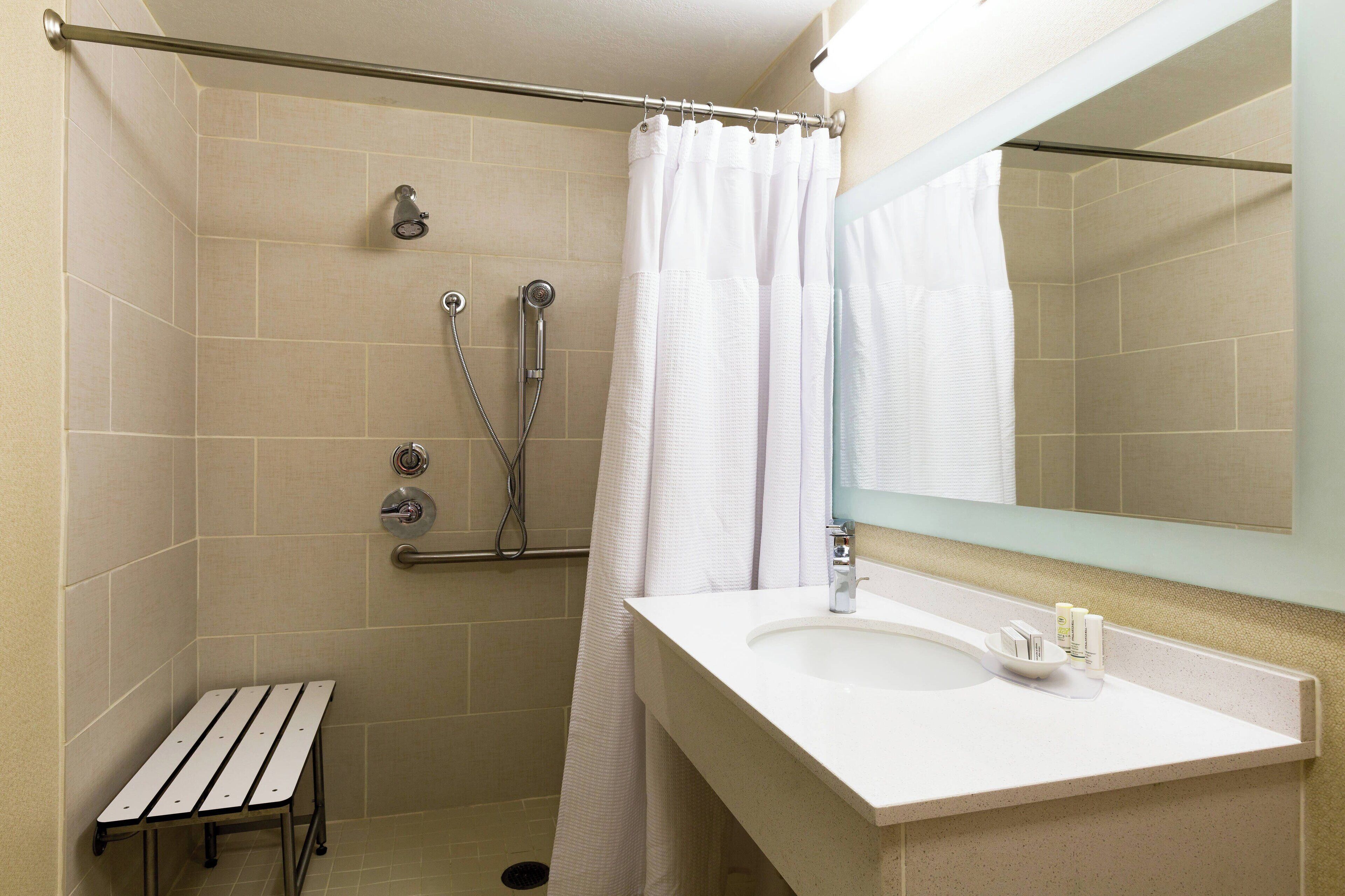 combined shower/bathtub, free toiletries, hair dryer, towels