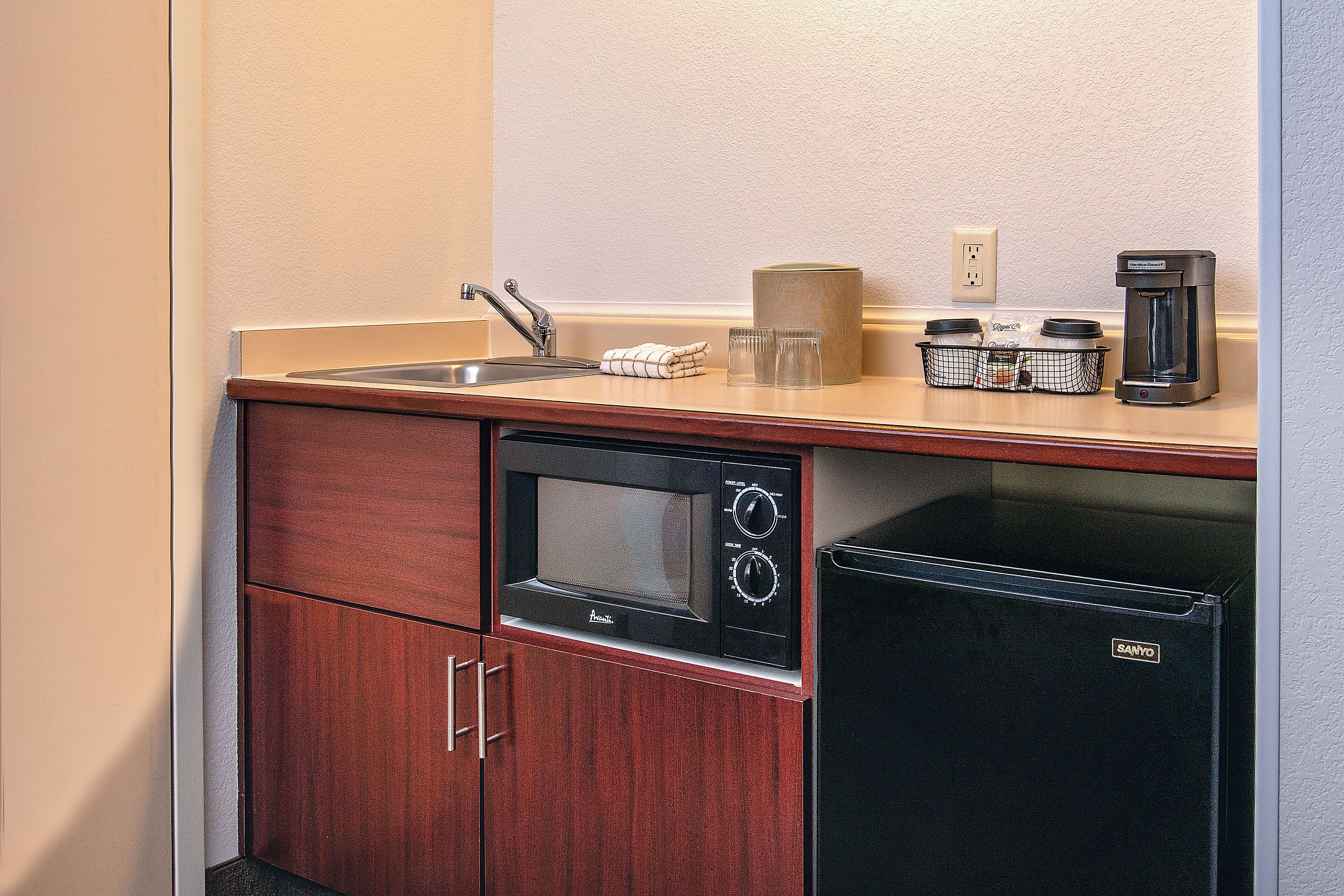 desk, blackout curtains, iron/ironing board, free cots/infant beds