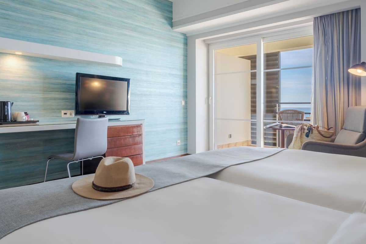 superior double or twin room, sea view | minibar, in-room safe, desk, blackout curtains