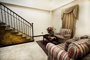 Living area | 21-inch flat-screen TV with cable channels, TV, pay films