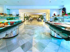 A buffet area with multiple food stations and a spacious layout. - Hotel Suites Albayzin del Mar (Almunecar)