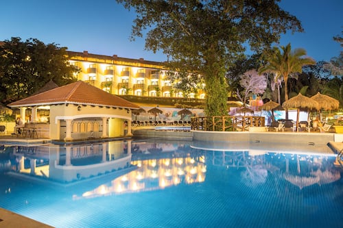 2 outdoor pools, open 8:00 AM to 8:00 PM, pool umbrellas, pool loungers