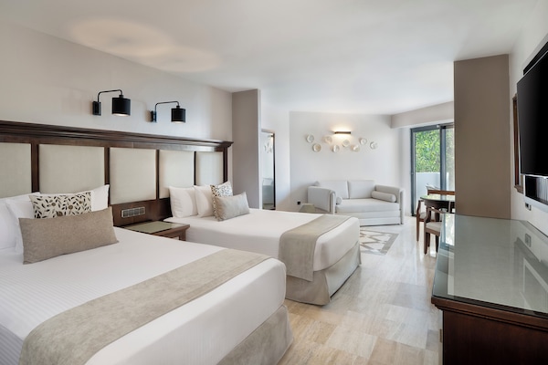Edredón, camas con efecto memoria y artículos del minibar gratis