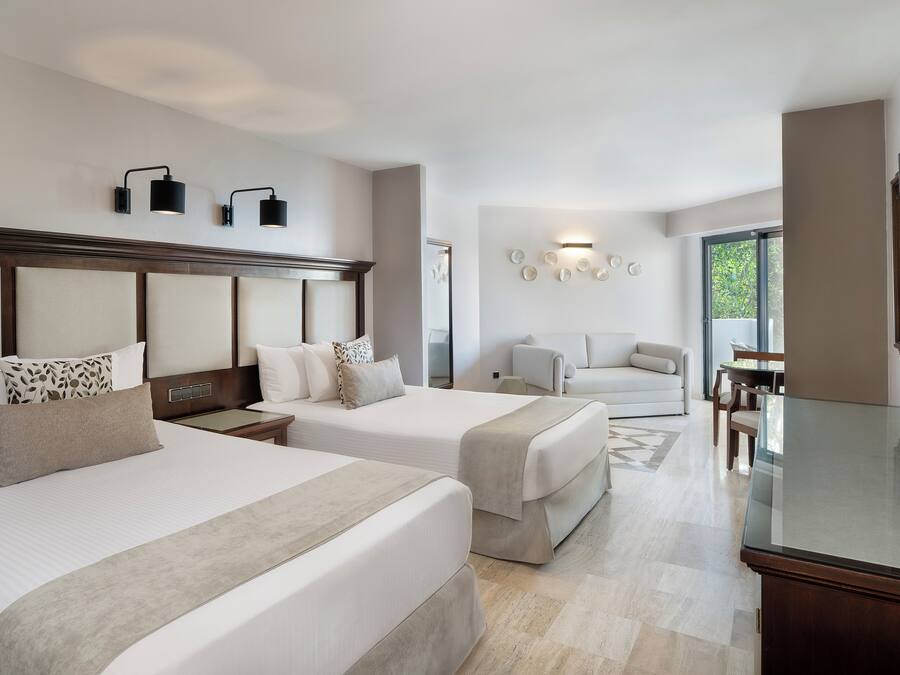 Down comforters, memory foam beds, free minibar, in-room safe