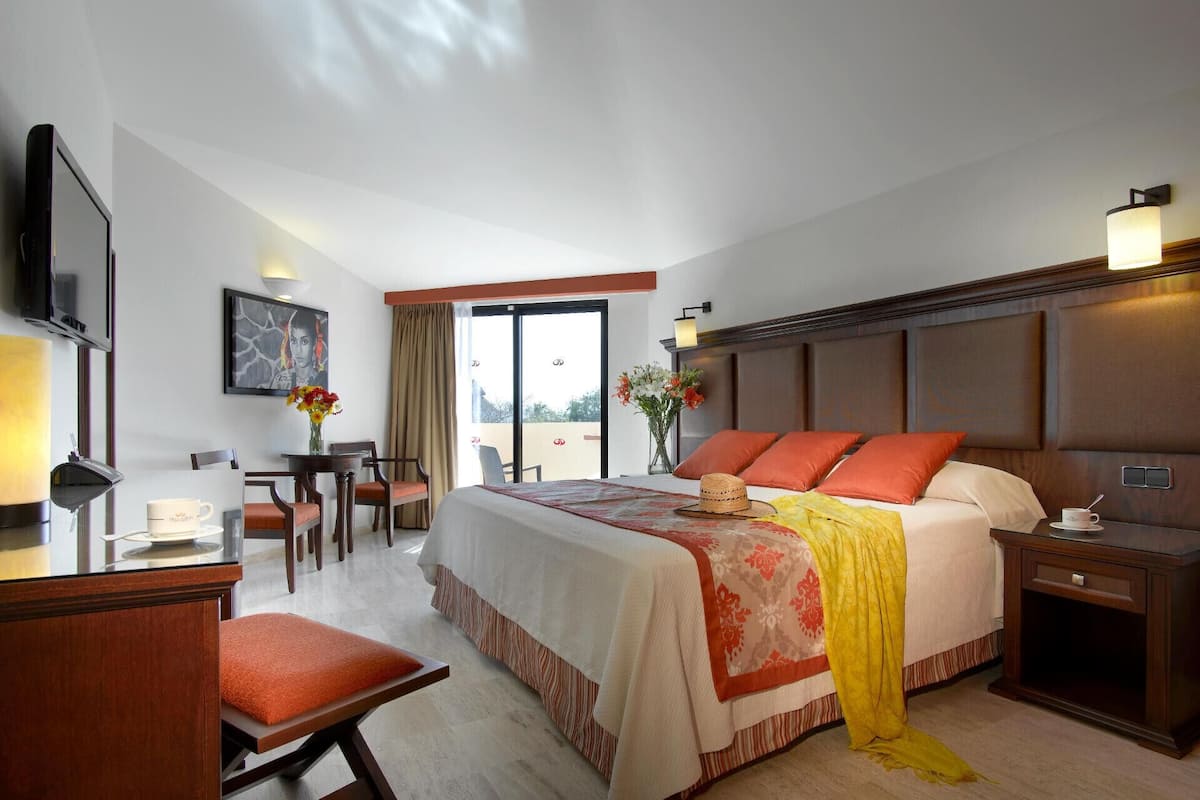 Down duvets, memory-foam beds, free minibar, in-room safe