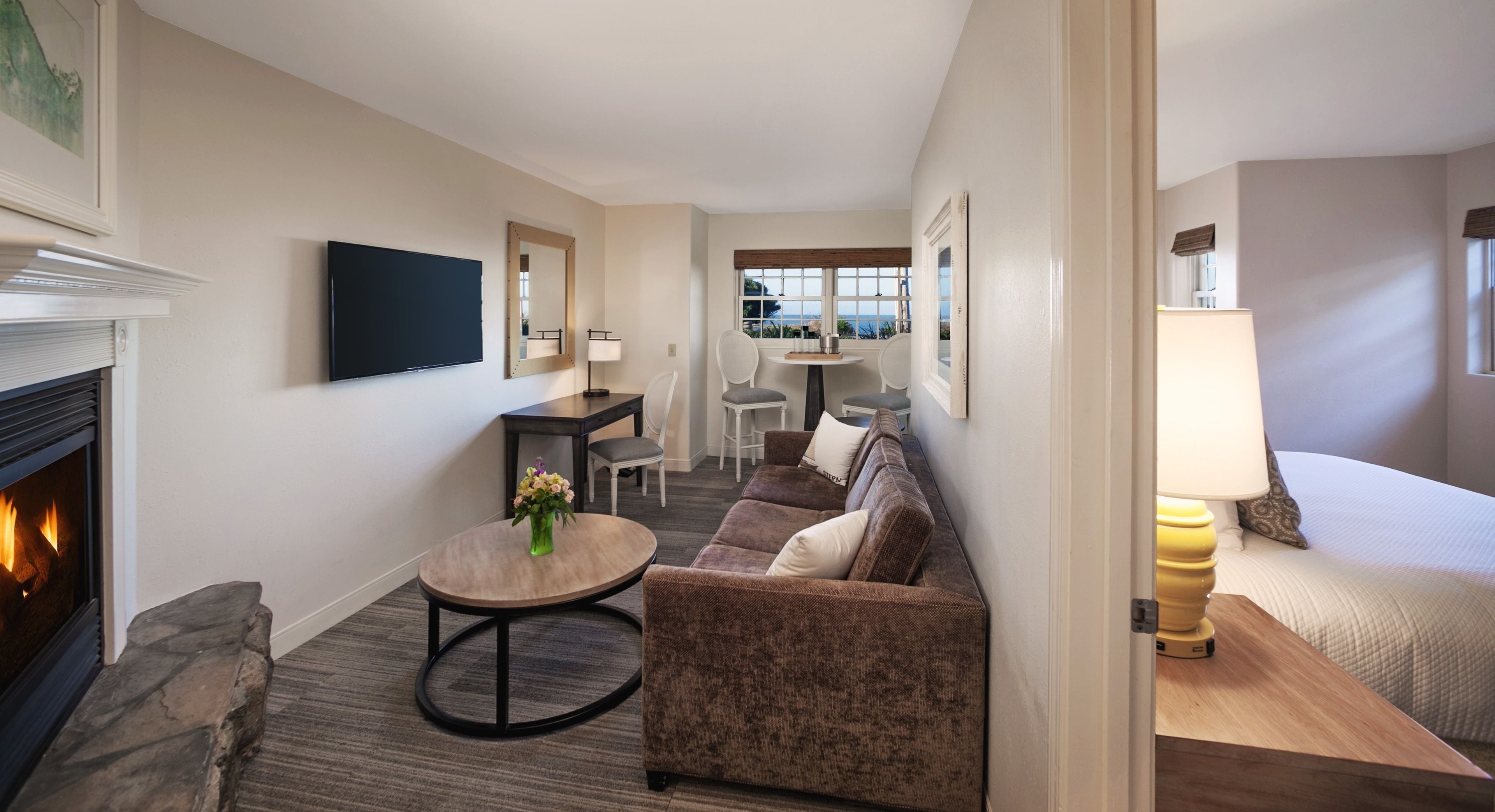 junior suite, 1 king bed, partial ocean view | living room | 37-inch lcd tv with satellite channels, tv