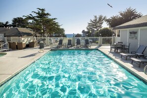 Outdoor pool, open 10:00 AM to 10:00 PM, pool umbrellas, sun loungers