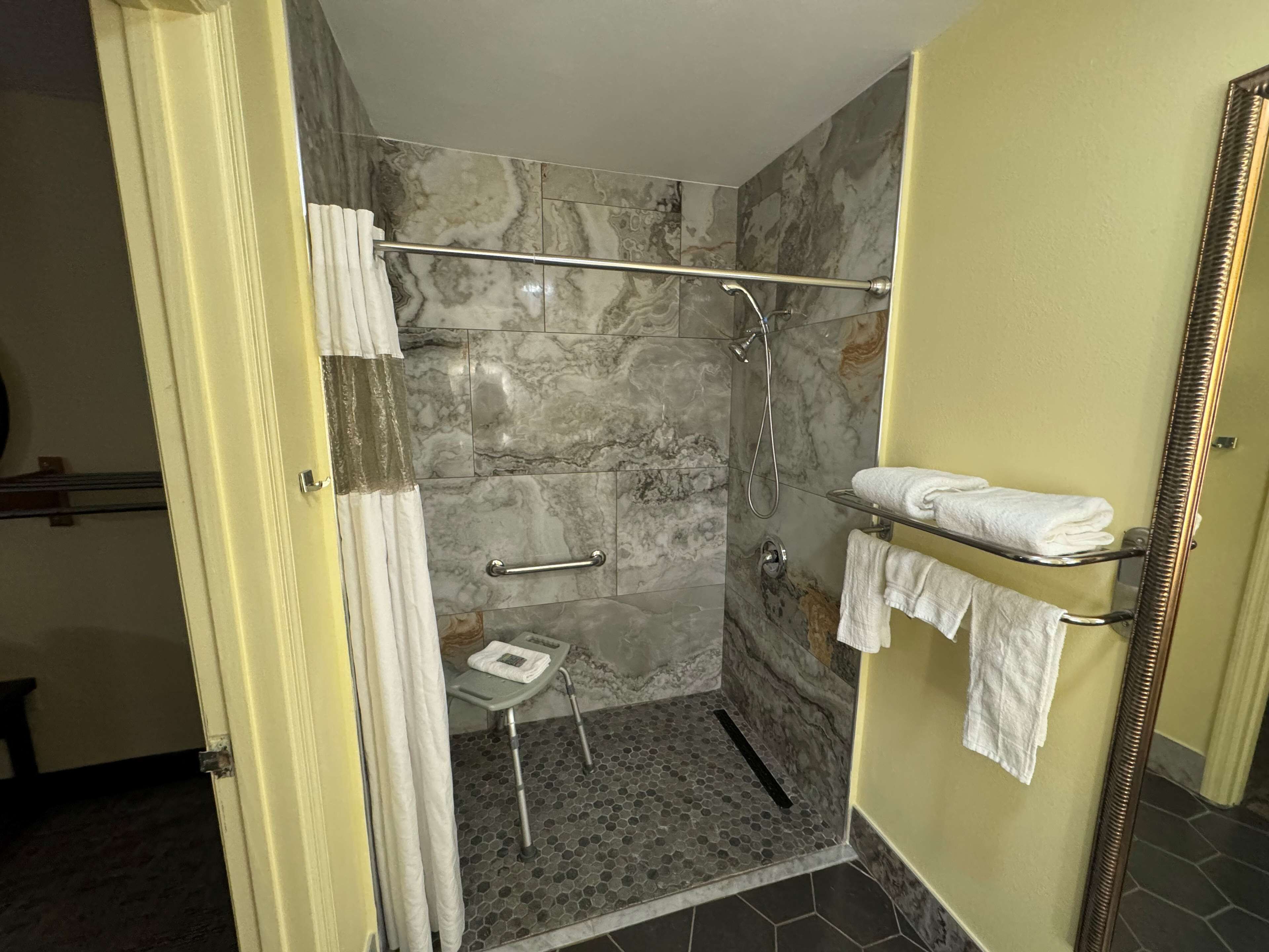 combined shower/bathtub, free toiletries, hair dryer, towels