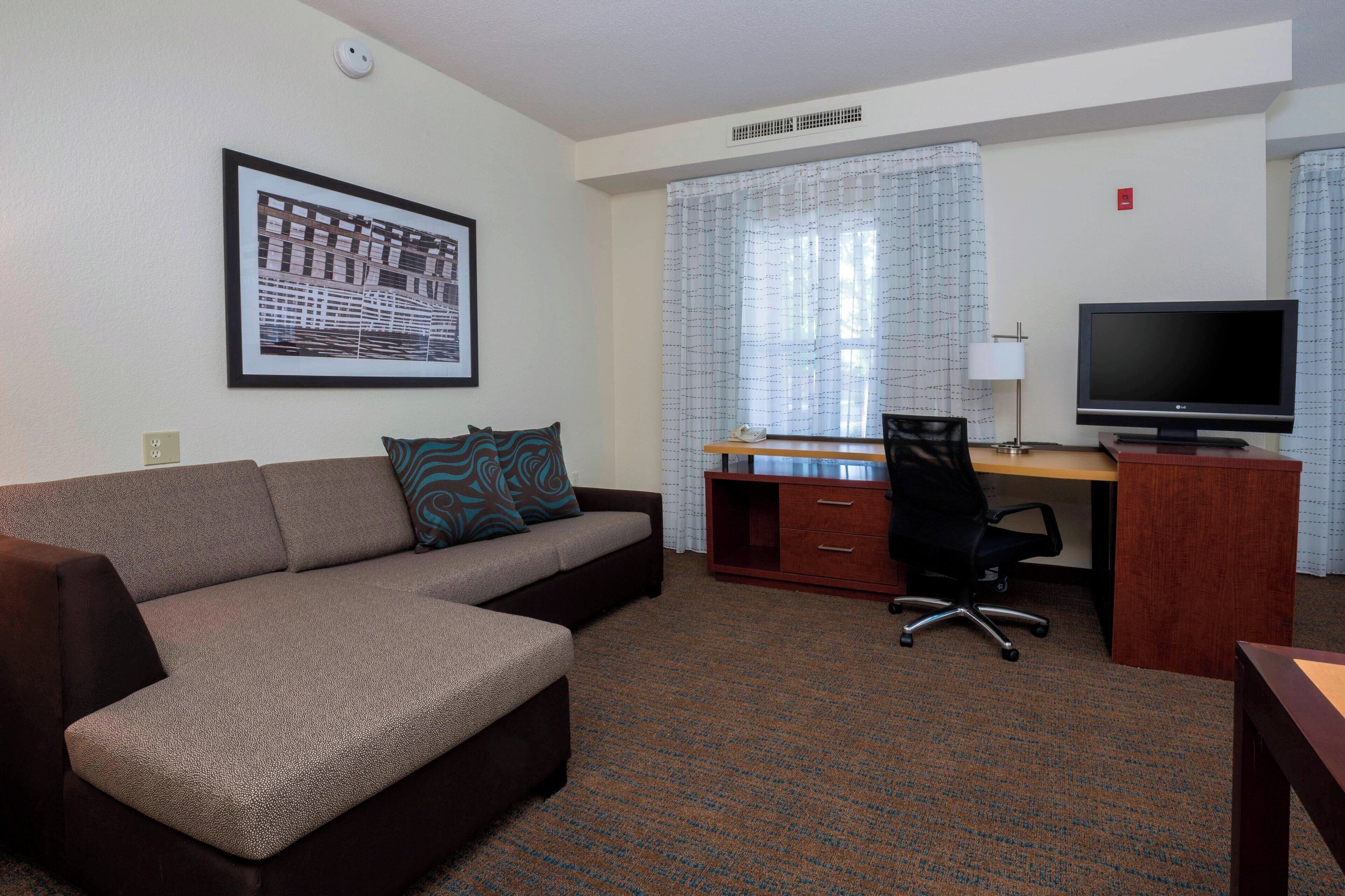 studio, 1 king bed with sofa bed | living area | 42-inch lcd tv with cable channels, tv, netflix