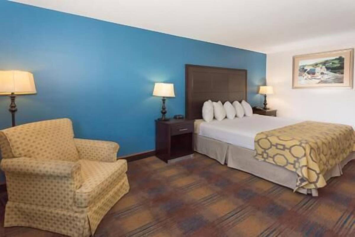 Premium bedding, desk, blackout drapes, iron/ironing board