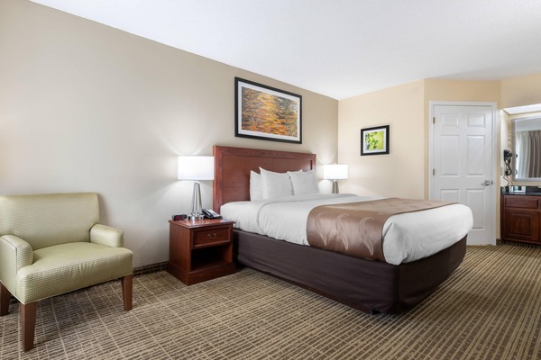 Pillowtop beds, desk, blackout drapes, iron/ironing board