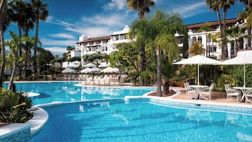 2 outdoor pools, pool umbrellas, pool loungers