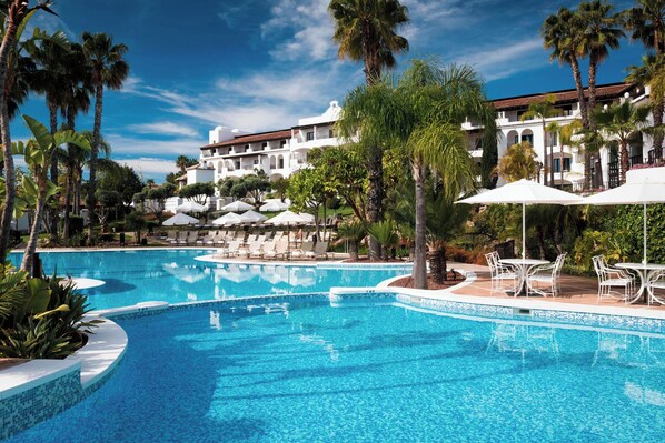 2 outdoor pools, pool umbrellas, sun loungers