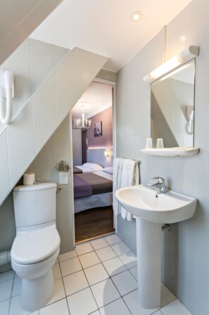 Shower, rainfall showerhead, hair dryer, towels