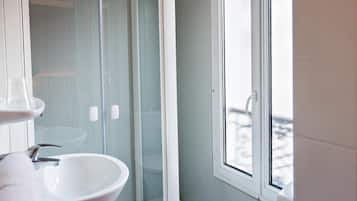 Shower, rainfall showerhead, hair dryer, towels