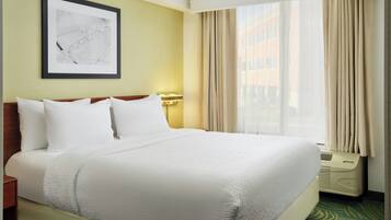 Down comforters, desk, laptop workspace, blackout drapes