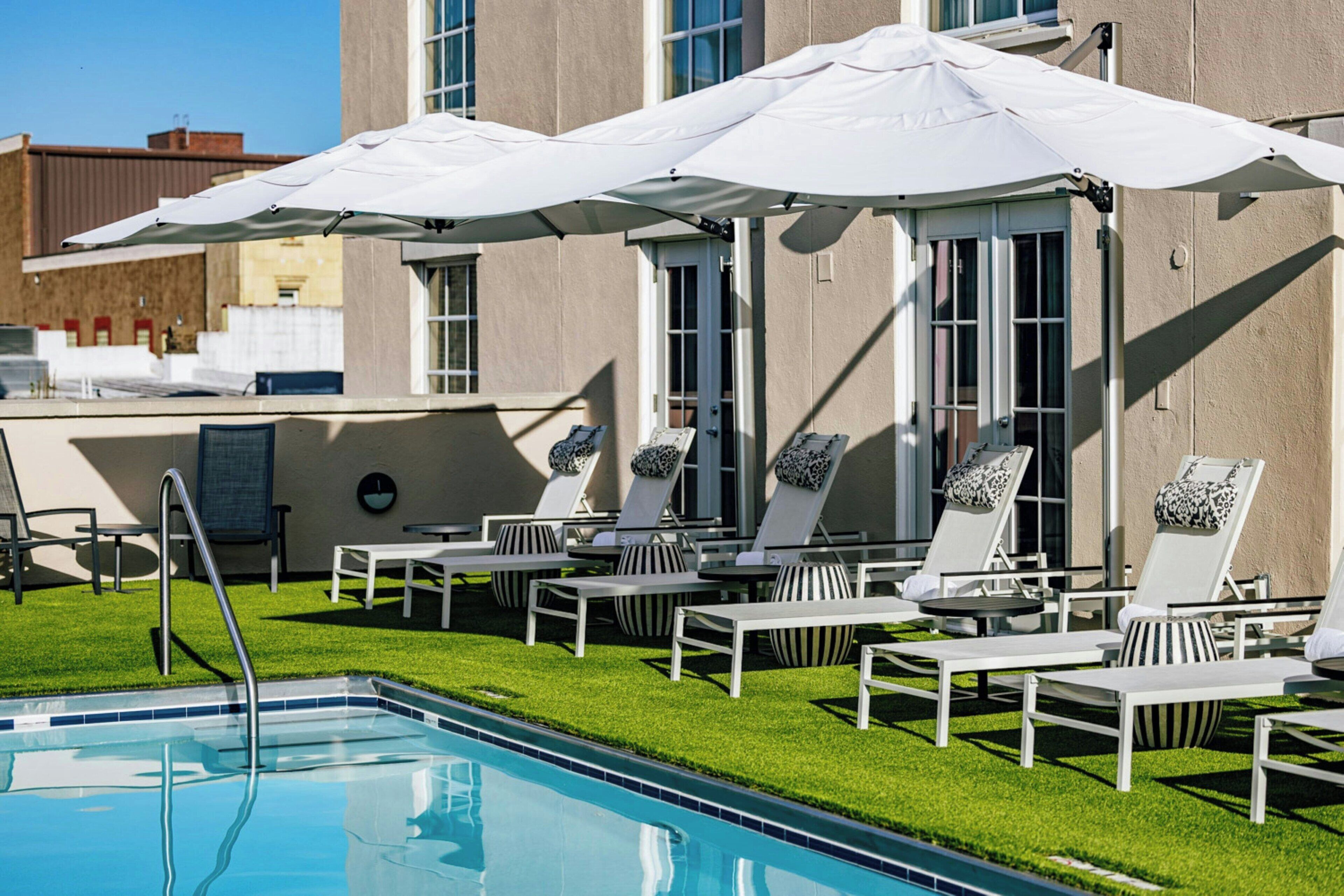 outdoor pool, open 7:30 am to 6:30 pm, pool loungers